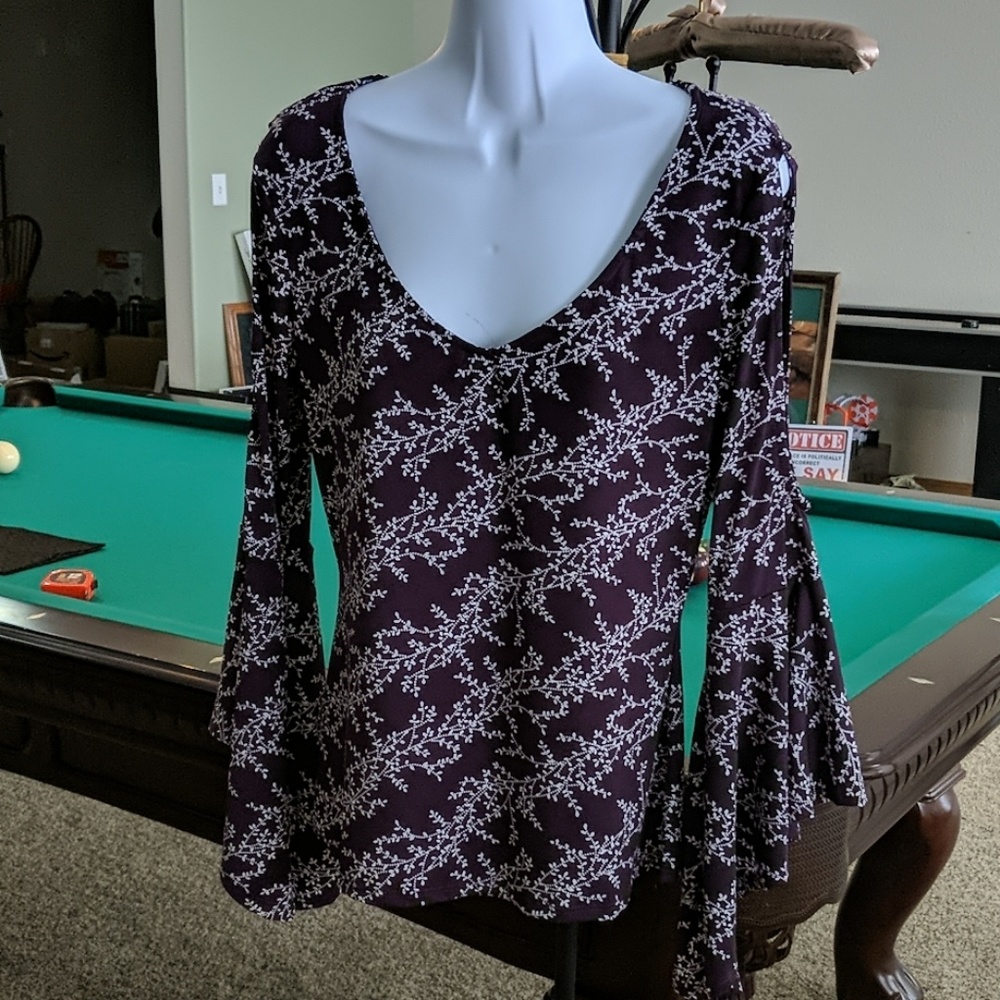 Cold shoulder blouse.